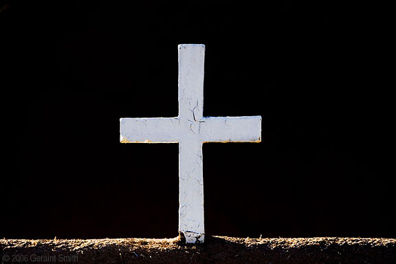 The cross on the portal at St Francis church Ranchos de Taos, NM