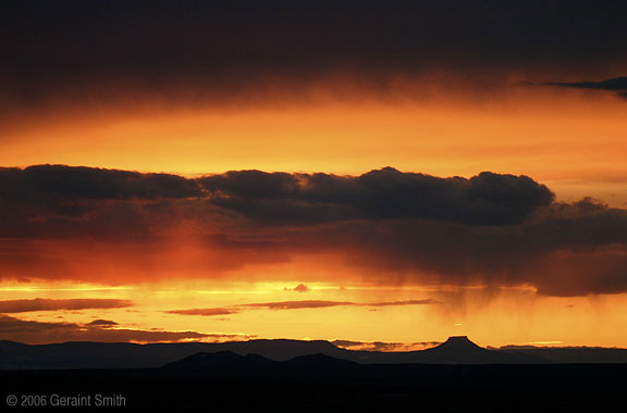 Sunset over Cerro Pedernal near Abiquiu, seen from Taos, New Mexico