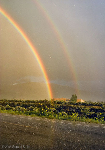 Rainbows and hail during an incredible downpour in Taos, NM