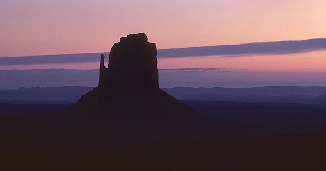 "Waking butte" Dawn and Right Mitten in Monument Valley Navajo Tribal Park, Arizona