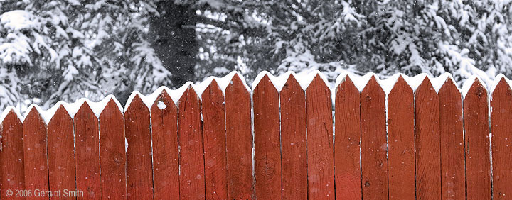 Red Fence in Snow