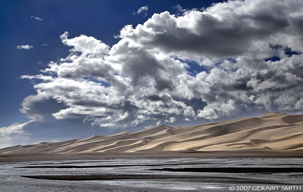 The seasonal river is flowing icy cold this weekend in the Great Sand Dunes Natiaonal Park and Preserve, Colorado