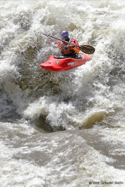 Huge water ... my friend John Fullbright at Sows Hole on the Rio Grande in Pilar NM , Jackson kayak,