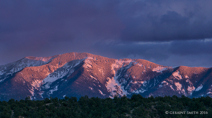 A last spot of light on Taos Mountain
