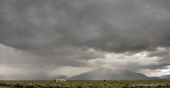 Summer storm on Taos Mountain house