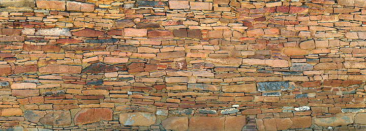 This is a portion of a large panorama of a wall in the Pueblo Alto Complex at Chaco Culture National Historic Park, New Mexico. I took photo this because I was attracted to the way the colors and undulations of the land are represented in the wall.