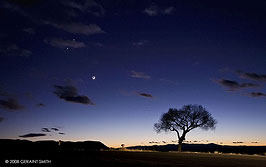 December 2008 01, Venus and Jupiter conjuction, a waxing crescent moon and a few other celestial objects in the sky over Taos, NM