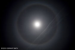 moon halo and vapor trails