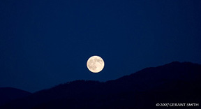 2007 September 27, Harvest moon rise last night over the Sangre de Cristo foothills near Taos Pueblo