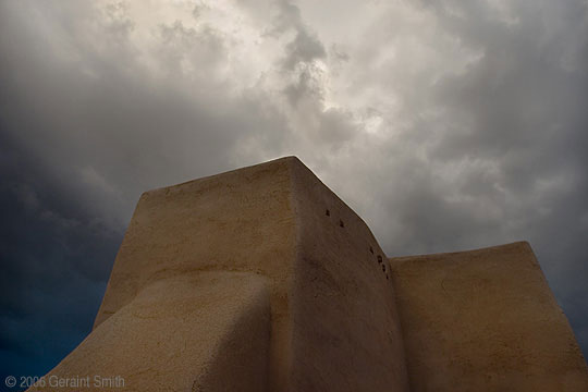 The church of St Francis in Ranchos de Taos under spring storm clouds