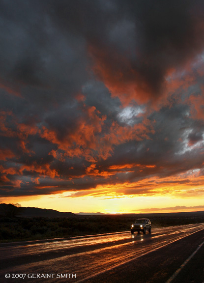 Highway rain ... sunset drive, Taos, NM