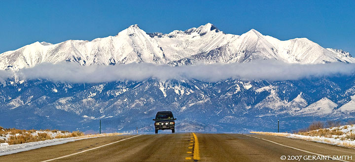 On the road in Colorado with a backdrop of Blanca Peak at Fort Garland