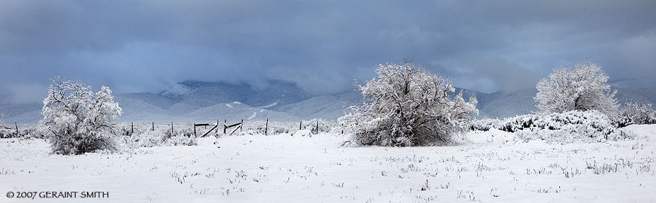 A pastoral winter scene in Taos yesterday ... and a view of the foothills with a break in the storm