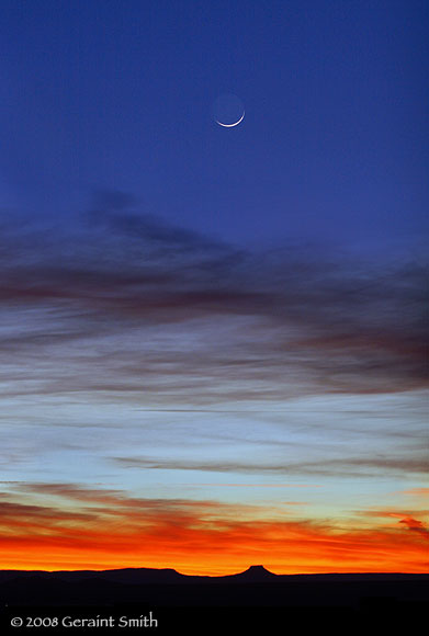 Crescent moon across the mesa over Cerro Pedernal