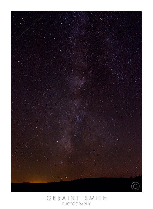 The Milkyway and the lights of Santa Fe and a satellite in the top left corner of the photo