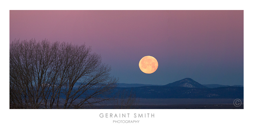 The morning moon across the Taos Volcanic Plateau from San Cristobal, NM