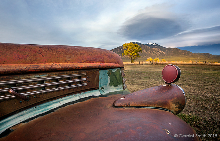 The classic GMC truck at Overland Ranch has been moved so it has a new view of Taos Mountain ... old age pays off