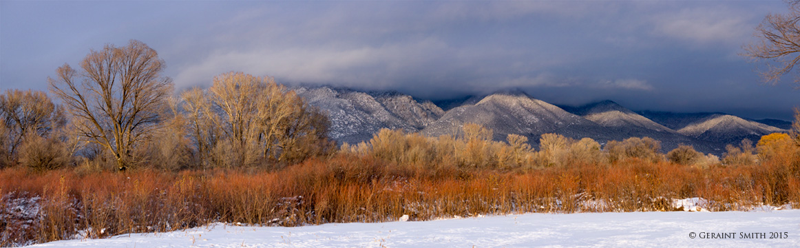 Keeping it natural, the subtle winter colors of Taos Mountain, red willows and cottonwoods