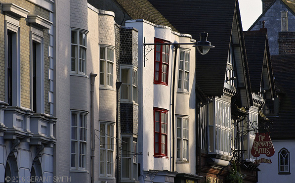 Buildings and 'The Brewers Arms' on the main st in Lewes, East Sussex, England