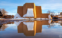 2013 December 01  Couldn't resist another shot of the St. Francis church  reflecting in a puddle of snowmelt