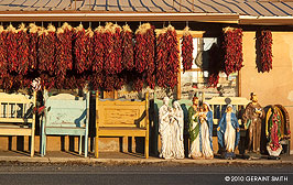 jesus statues and red chilis, Taos, NM