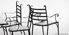 chairs in snow at overland ranch, Taos