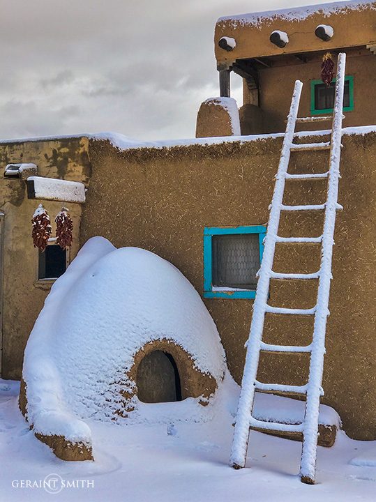 Horno (oven), ladder, snow, red chiles, adobe