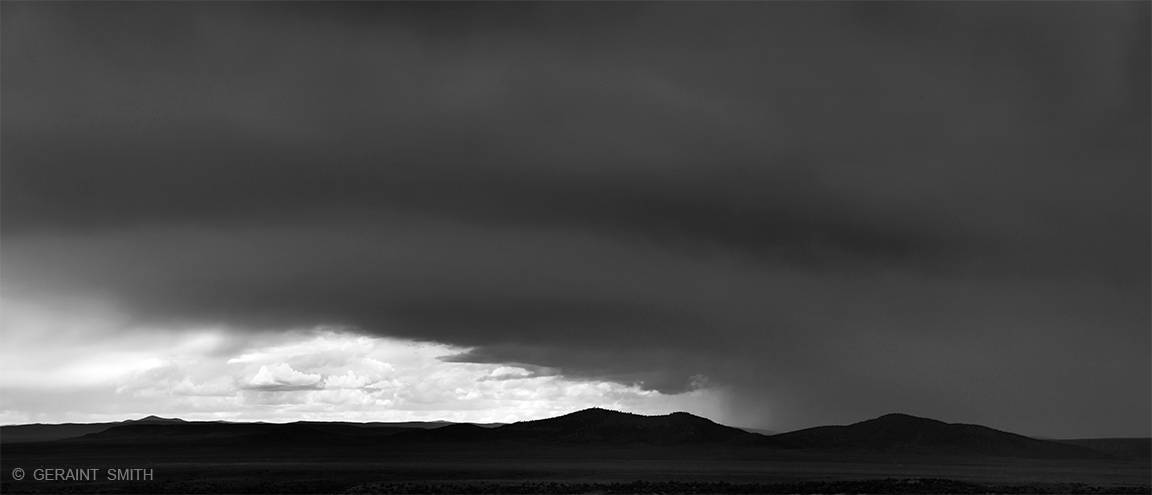 Light, with black clouds, Taos Plateau.