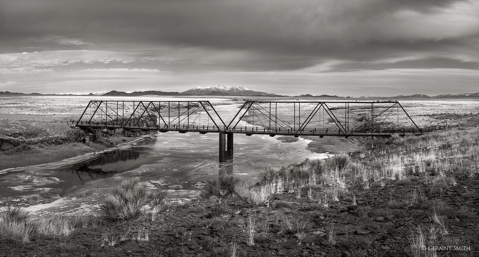 Lobatos bridge with Blanca Peak and the Rio Grande Colorado, black and white