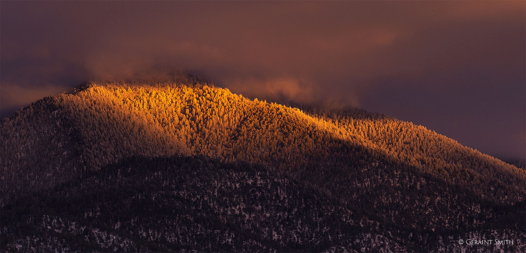 Sunset, mountains from San Cristobal, NM