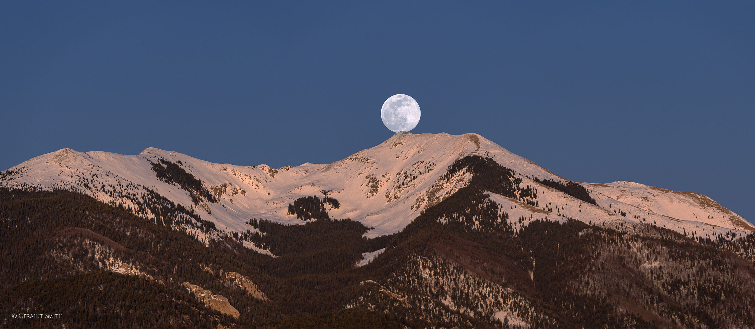 Snow moon rising over Vallecito Mountain