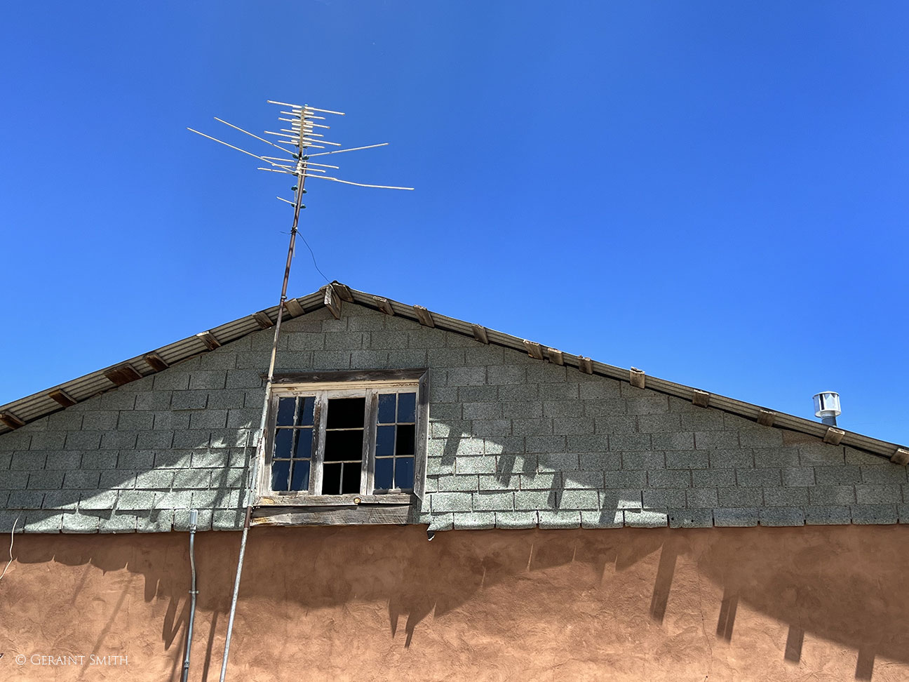 Building with TV antenna, Truchas, NM 