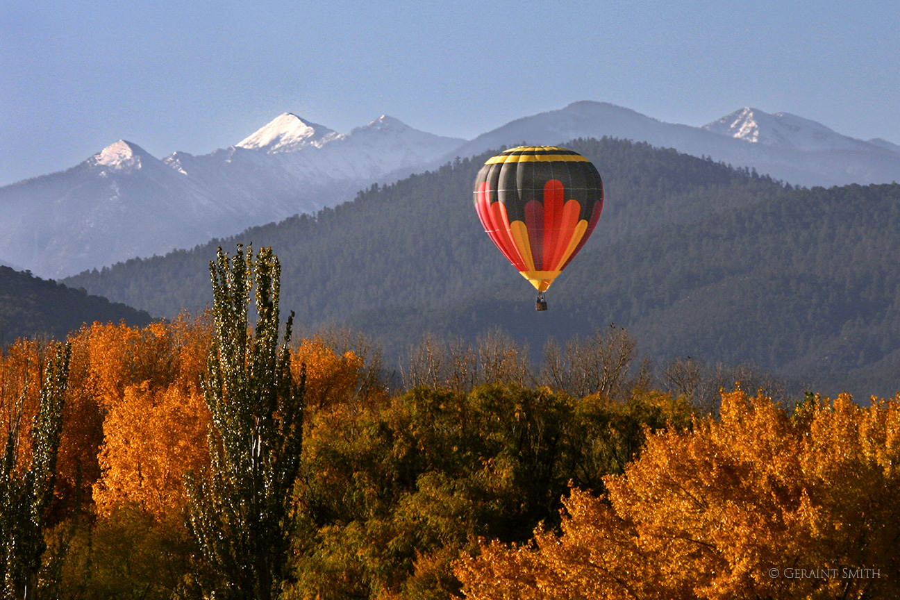 Balloon with snow capped peaks Taos Mountain Balloon Rally