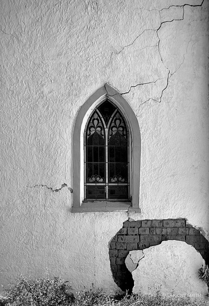 Church window and adobes, Colorado